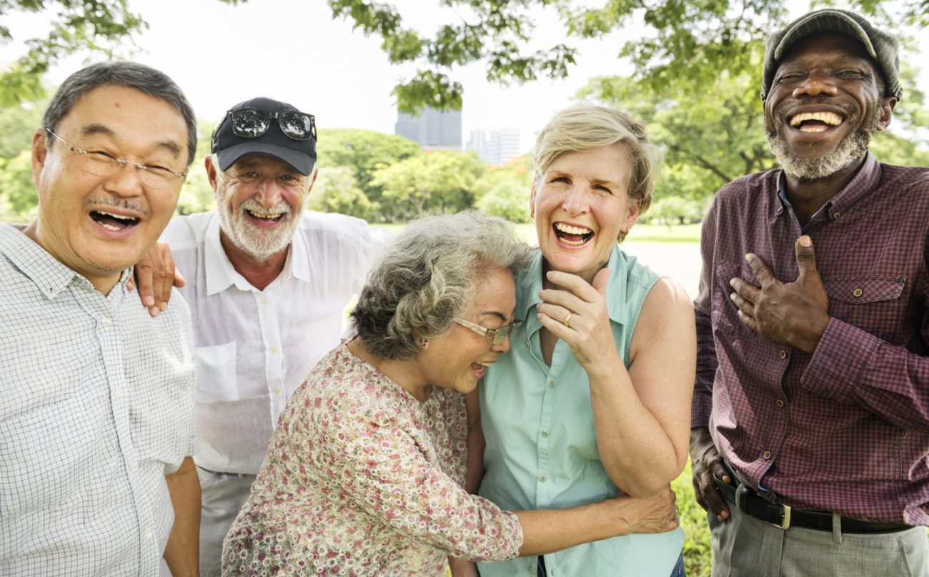 group of seniors laughing and enjoying themselves restorative dentistry marrero la