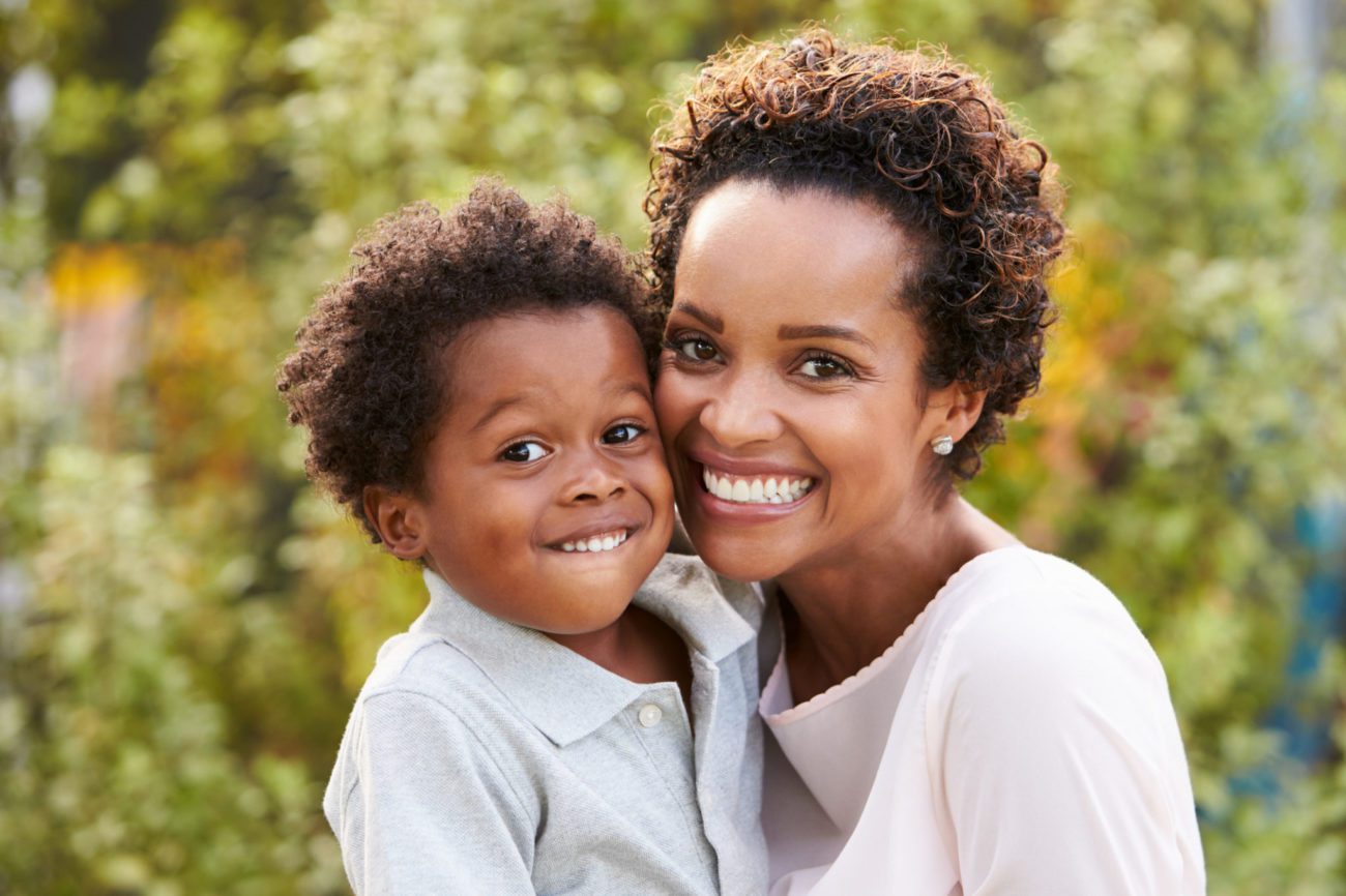 Portrait of young mother with toddler son dental cleanings for all ages marrero la